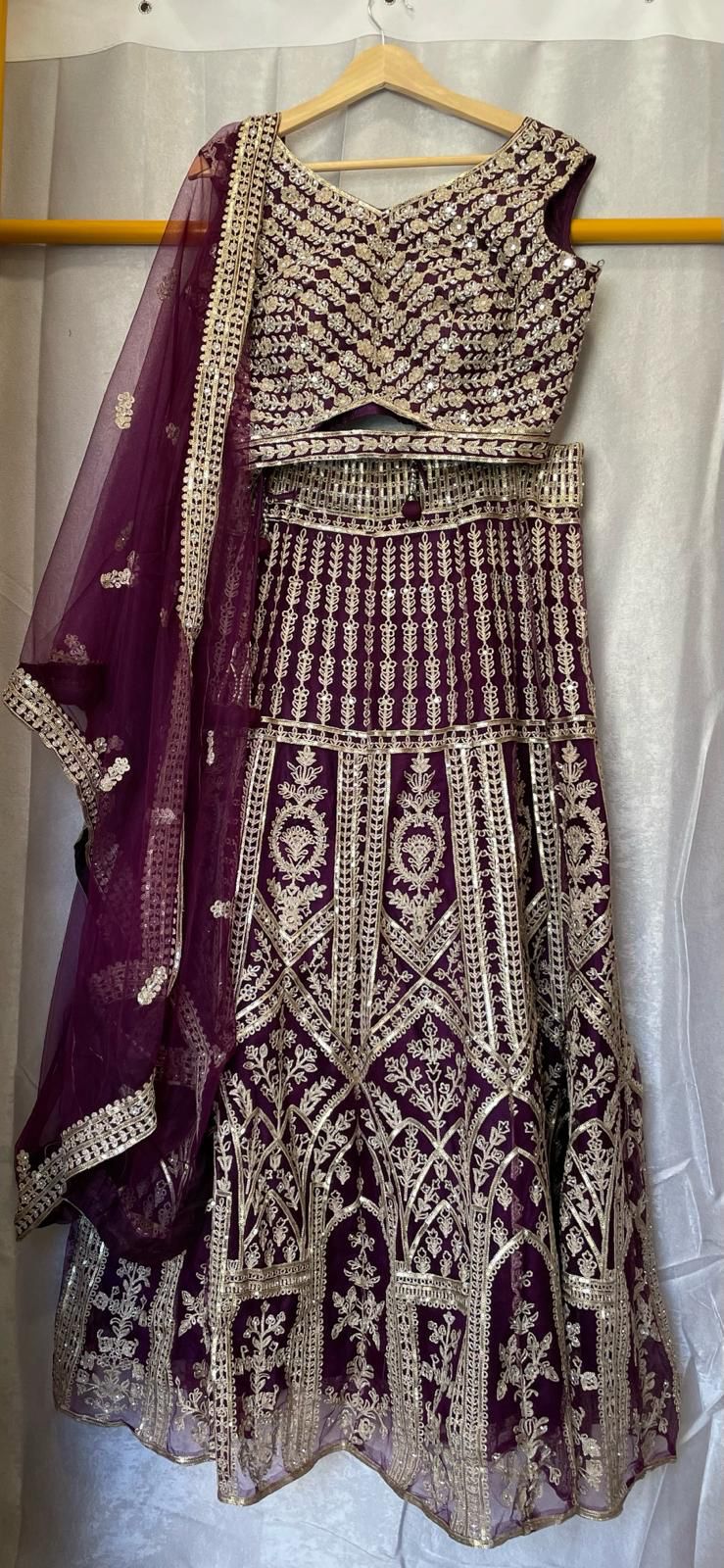 Aari work and zarkan designer wine lehenga with stylish choli