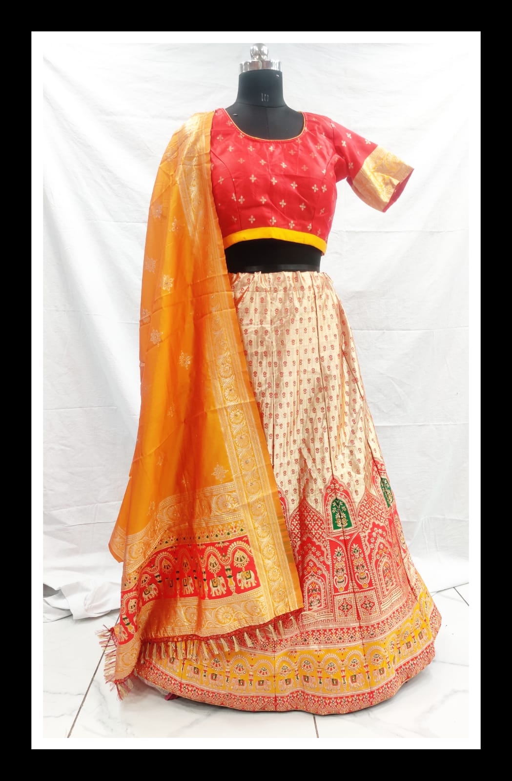 Banaras cream orange red lehenga with diamond work