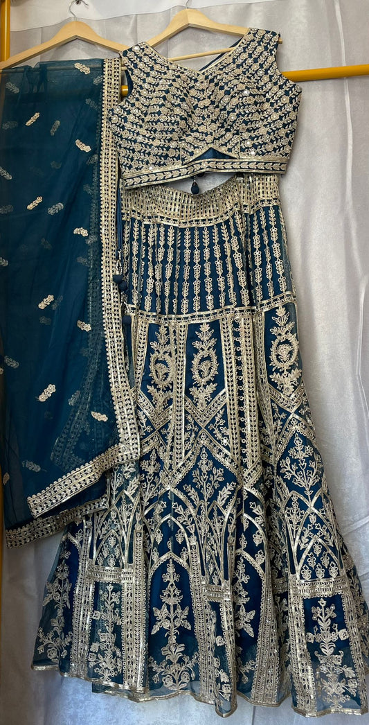 Aari work and zarkan designer blue lehenga with stylish choli