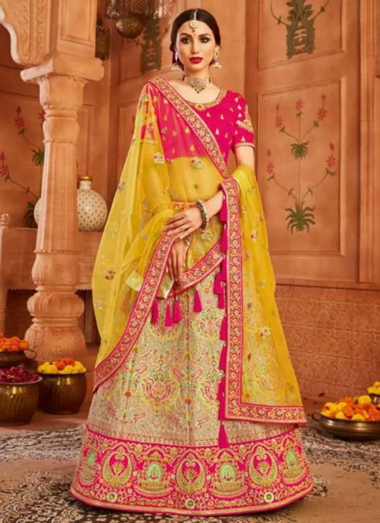 Banaras yellow mint pink zarkan embroidery heavy lehenga with designer blouse